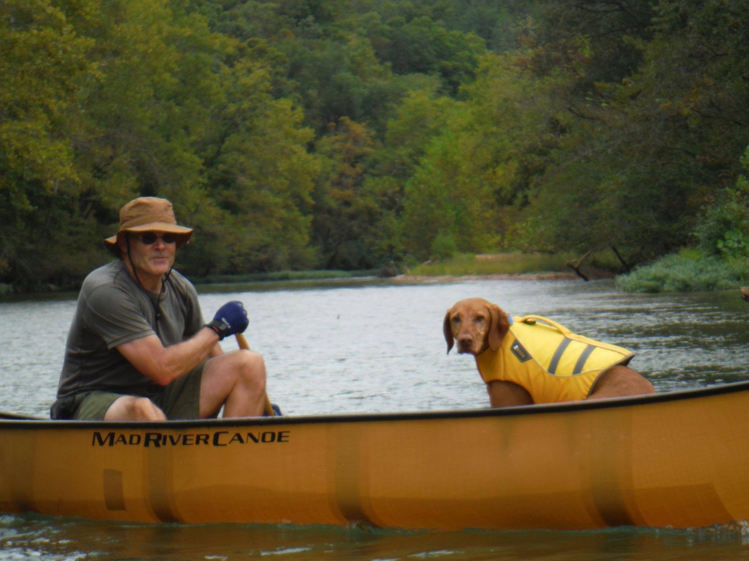 Dr. Langley and Dog in Canoe